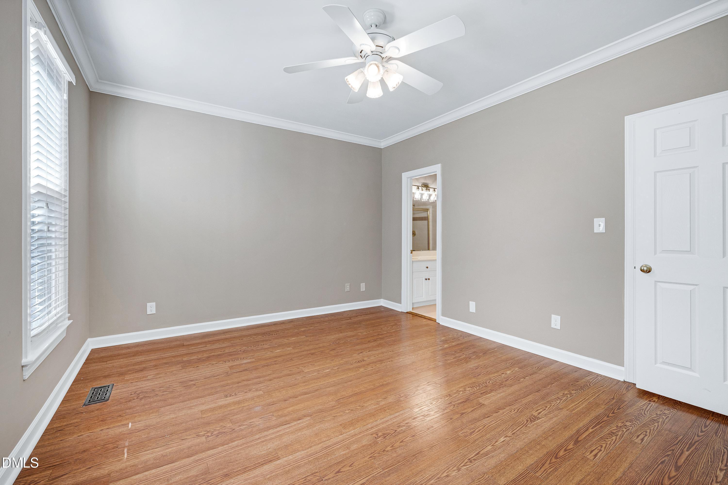 4804 Sinclair Drive Raleigh, NC 27616 - Photo 17 of 37 wooden floor in an empty room with a window