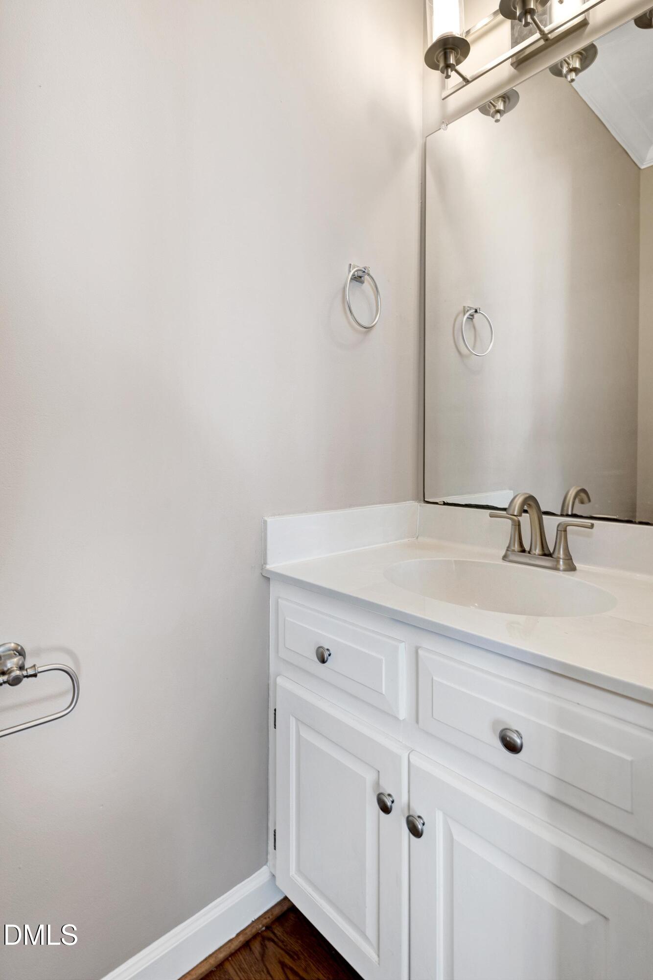 4804 Sinclair Drive Raleigh, NC 27616 - Photo 21 of 37 a bathroom with a sink and vanity