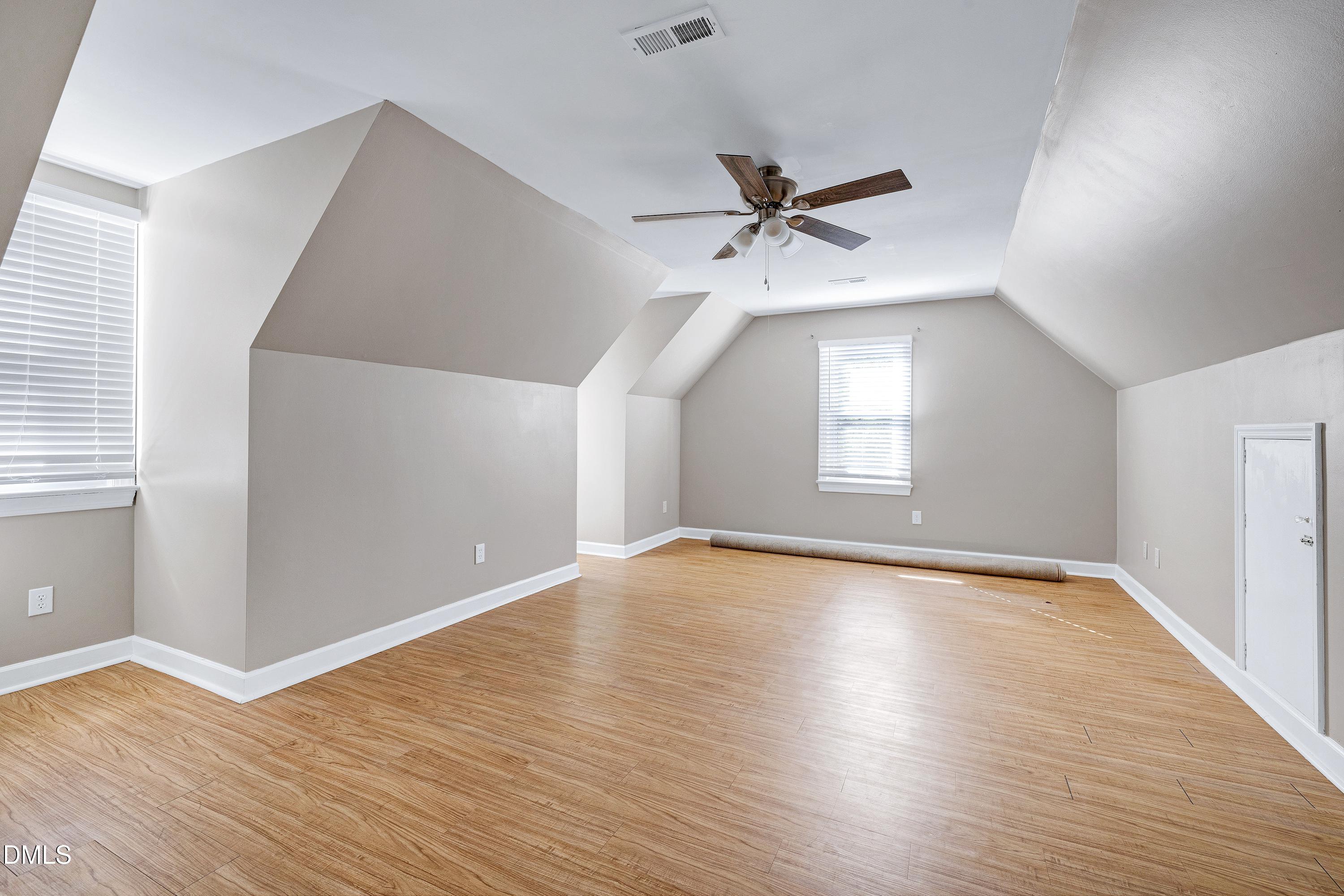 4804 Sinclair Drive Raleigh, NC 27616 - Photo 27 of 37 wooden floor in an empty room with a window