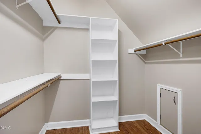 a view of an empty walk in closet