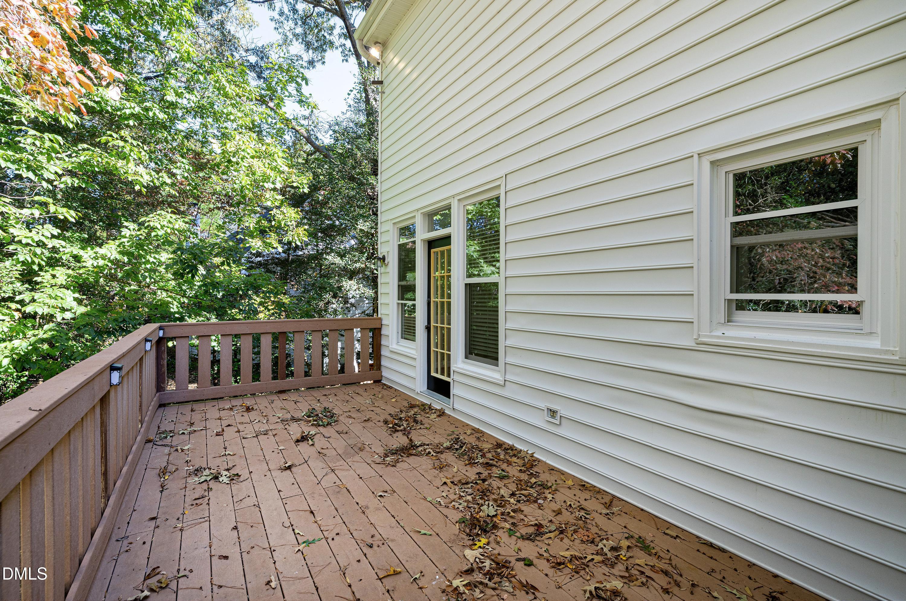 4804 Sinclair Drive Raleigh, NC 27616 - Photo 34 of 37 a view of balcony with wooden floor and fence