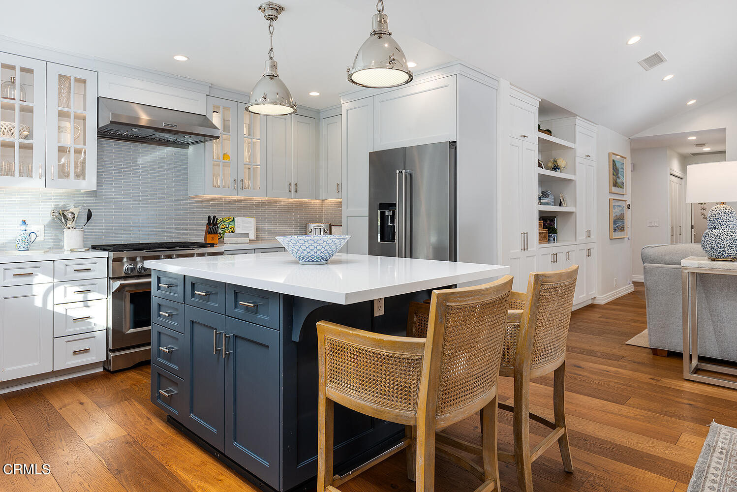 650 Westbridge Place Pasadena, CA 91105 - Photo 13 of 31 a kitchen with a table chairs sink and cabinets