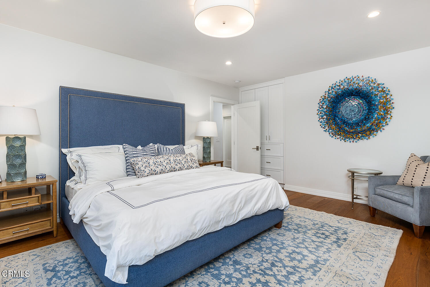 650 Westbridge Place Pasadena, CA 91105 - Photo 15 of 31 a bedroom with a bed and a chandelier