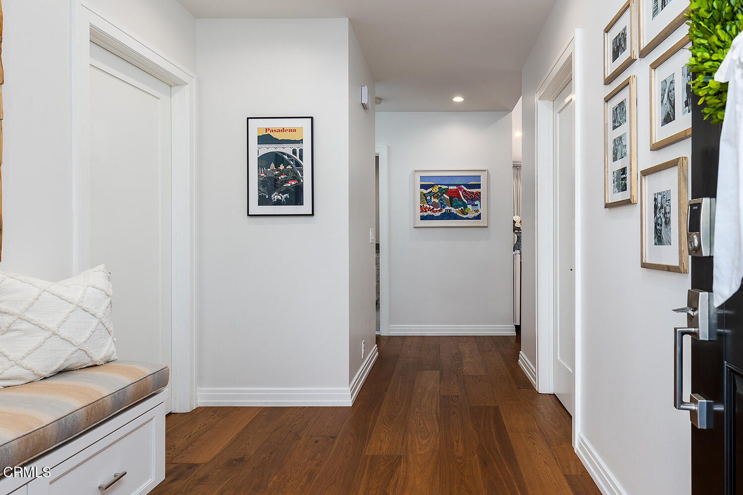 650 Westbridge Place Pasadena, CA 91105 - Photo 2 of 31 a view of a hallway with wooden floor and a living room