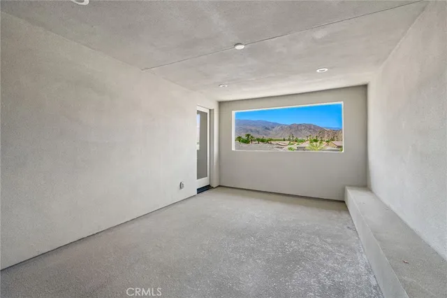 an empty room with window