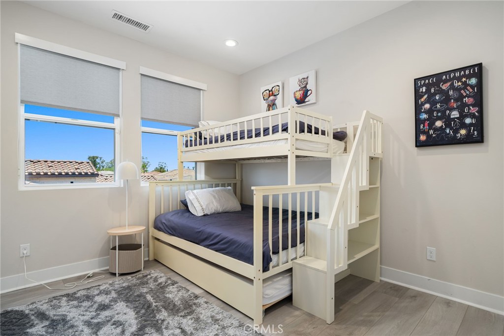 80380 Old Rnch Trail North La Quinta, CA 92253 - Photo 26 of 35 a bedroom with furniture and a window