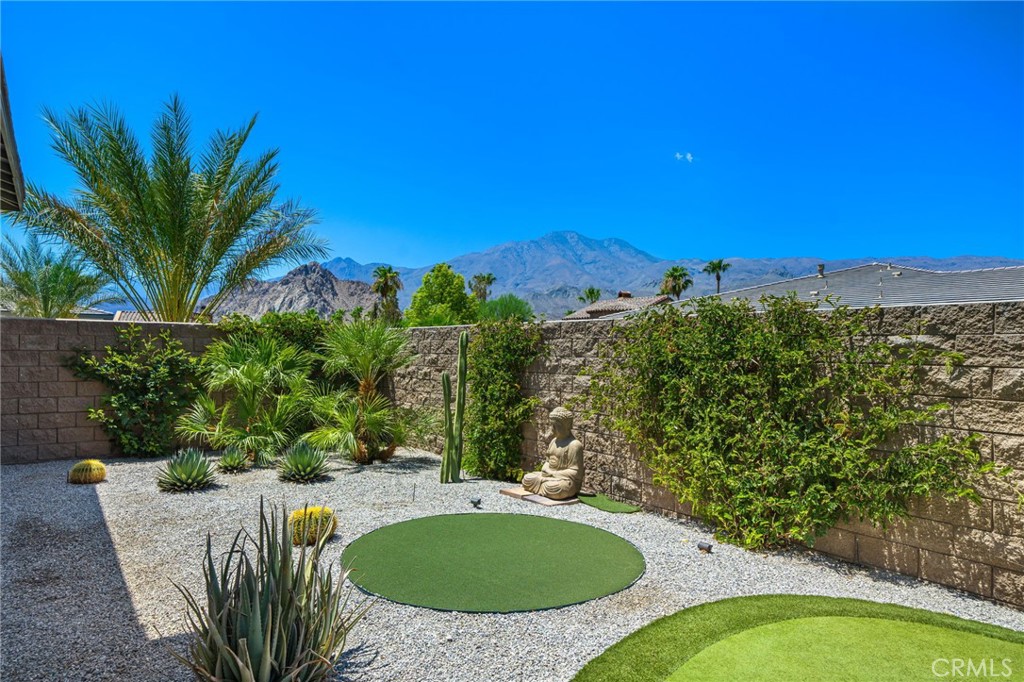 80380 Old Rnch Trail North La Quinta, CA 92253 - Photo 5 of 35 a view of a swimming pool with a patio