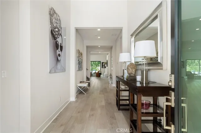 a view of a living room and dining room