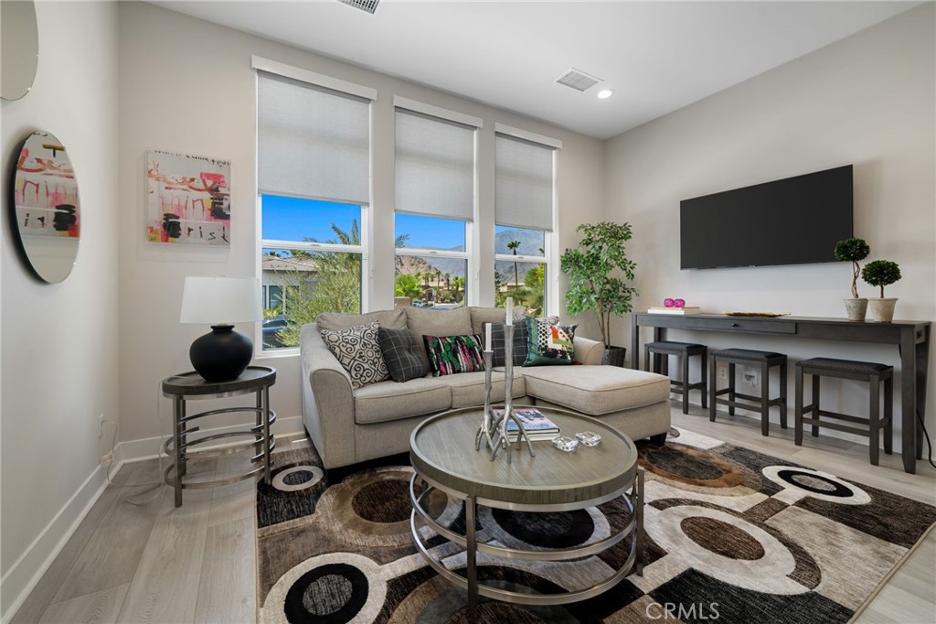 80380 Old Rnch Trail North La Quinta, CA 92253 - Photo 7 of 35 a living room with furniture and a flat screen tv