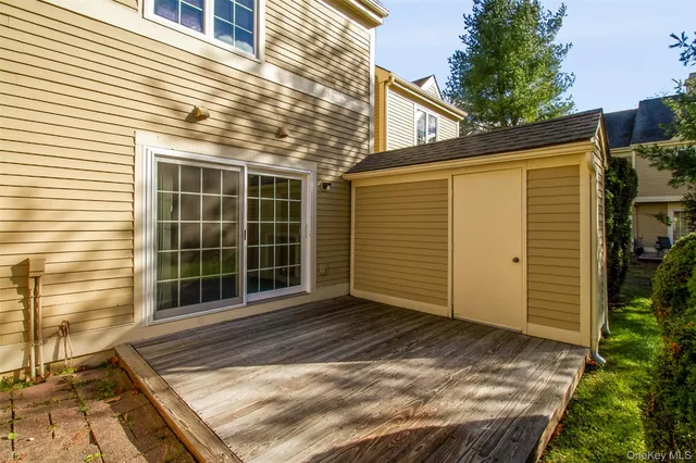 a view of backyard with blue space