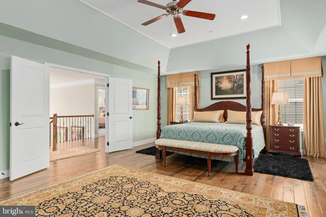 a bathroom with a granite countertop sink and mirror