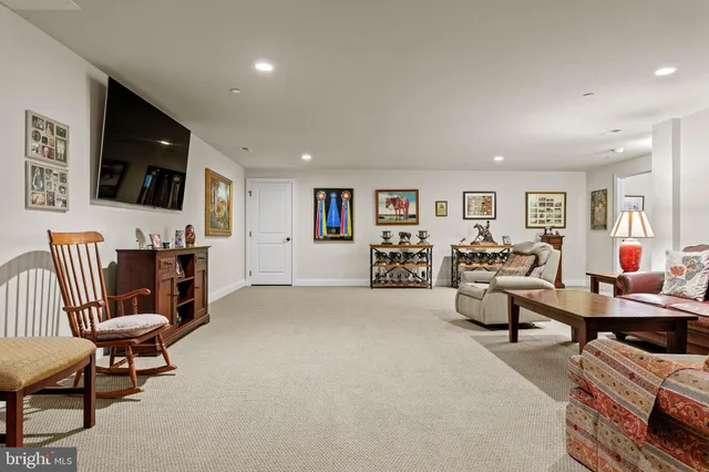 a view of house with a yard and deck