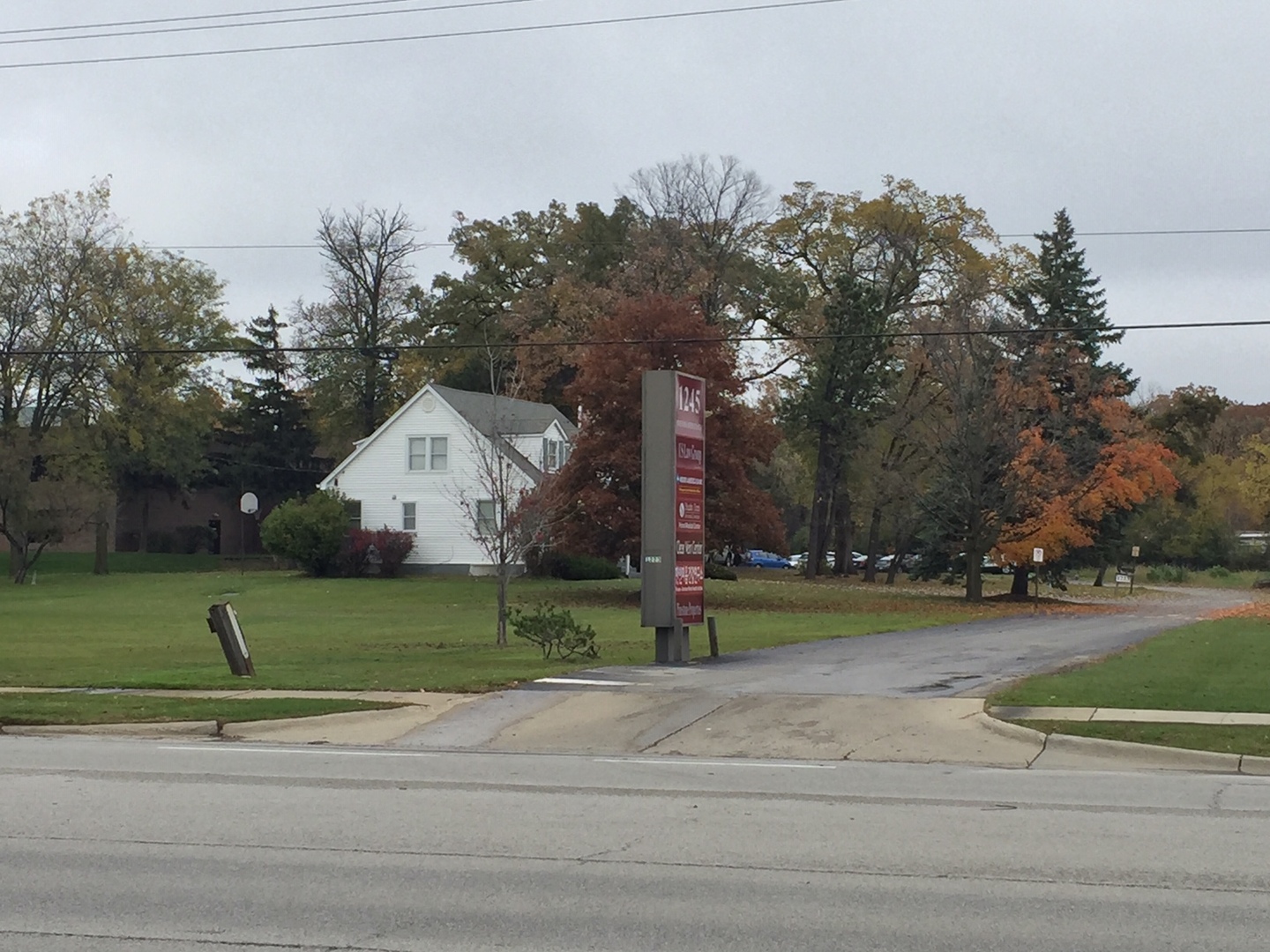 a view of a yard in front of a house