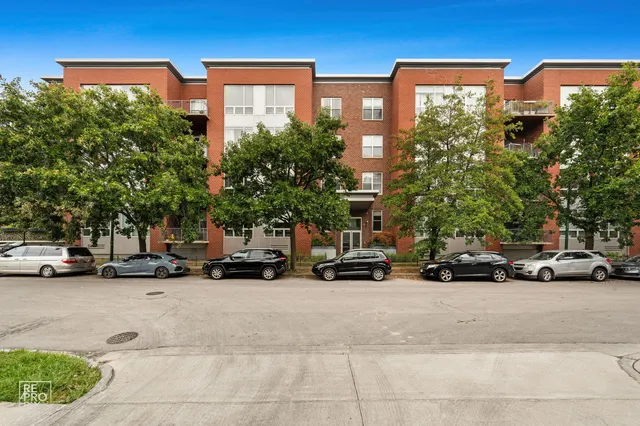 a view of a cars parked in front of a building