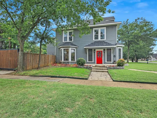 a view of outdoor space yard and front view of a house