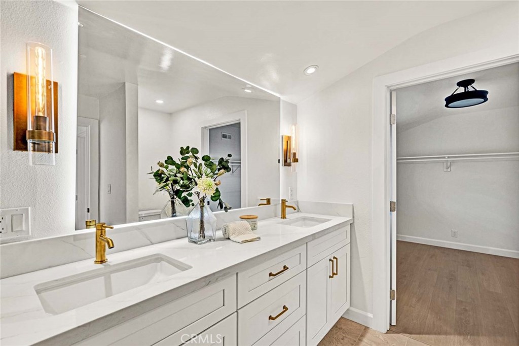 5331 Cerulean Avenue Garden Grove, CA 92845 - Photo 19 of 44 a bathroom with a double vanity sink and a