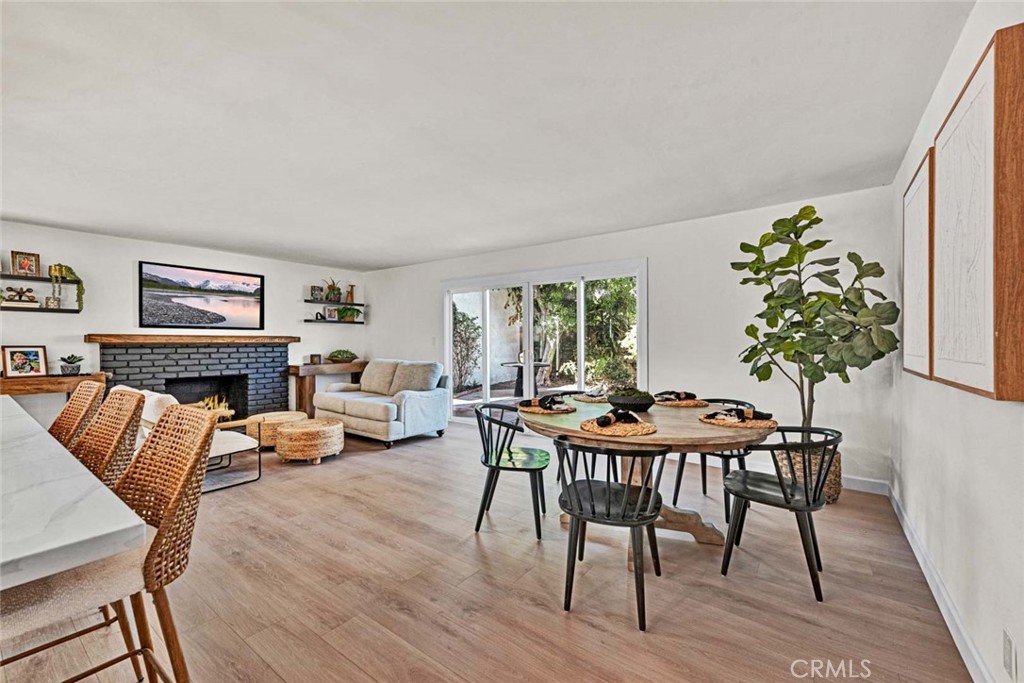 5331 Cerulean Avenue Garden Grove, CA 92845 - Photo 2 of 44 a workspace with furniture window and wooden floor