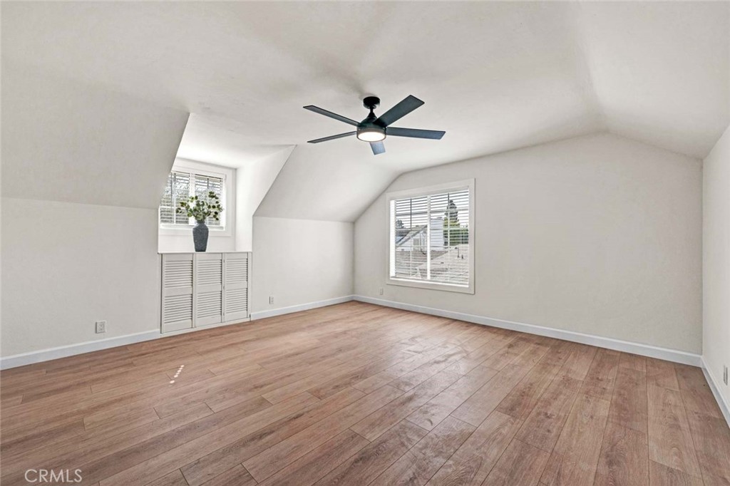 5331 Cerulean Avenue Garden Grove, CA 92845 - Photo 21 of 44 wooden floor in an empty room with a window