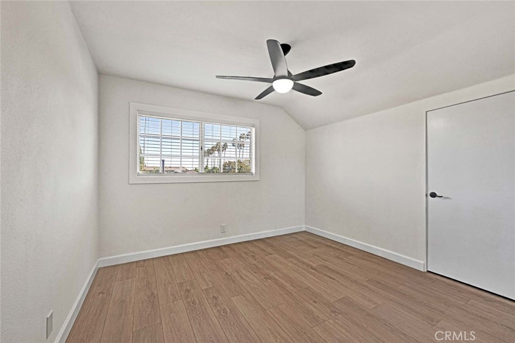 5331 Cerulean Avenue Garden Grove, CA 92845 - Photo 24 of 44 a view of empty room with wooden floor and fan