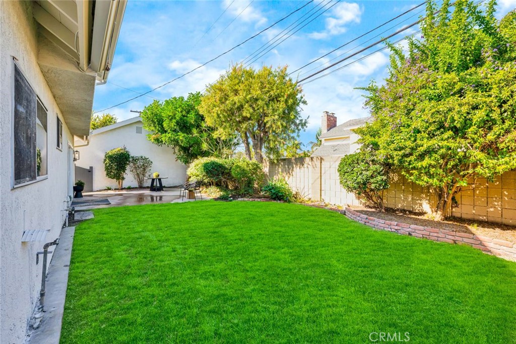 5331 Cerulean Avenue Garden Grove, CA 92845 - Photo 33 of 44 a backyard of a house with lots of green space