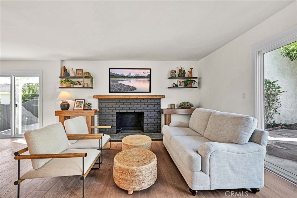 5331 Cerulean Avenue Garden Grove, CA 92845 - Photo 8 of 44 a living room with furniture and a fireplace