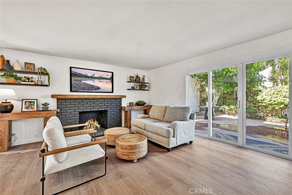 5331 Cerulean Avenue Garden Grove, CA 92845 - Photo 10 of 44 a living room with furniture and a fireplace