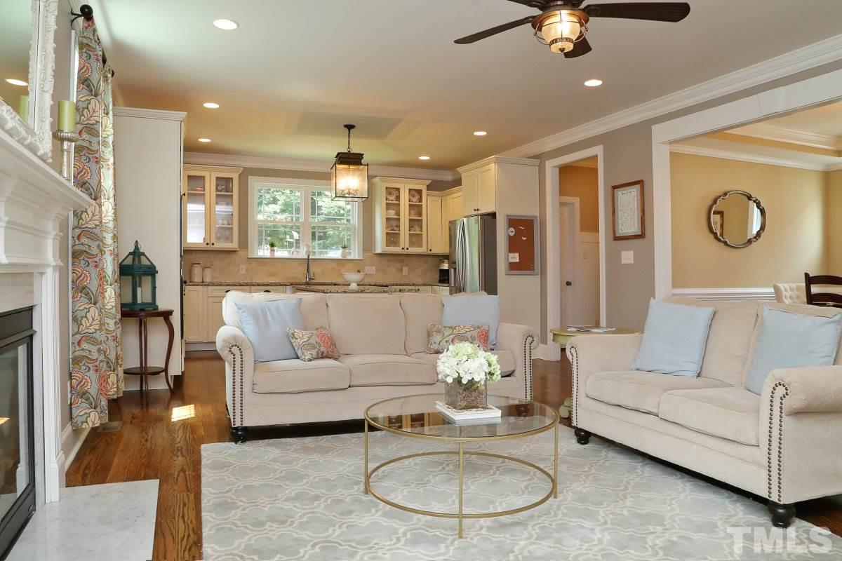 315 Georgetown Road Raleigh, NC 27608 - Photo 23 of 24 Open floor plan flows from family room to kitchen. Perfect for entertaining.