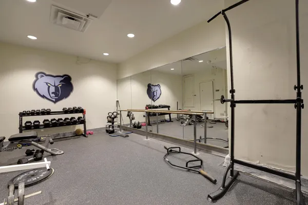 a kitchen with counter top space cabinets and appliances