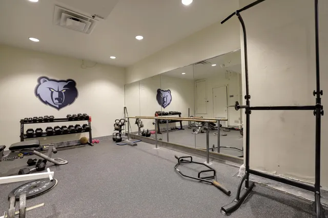 a kitchen with counter top space cabinets and appliances