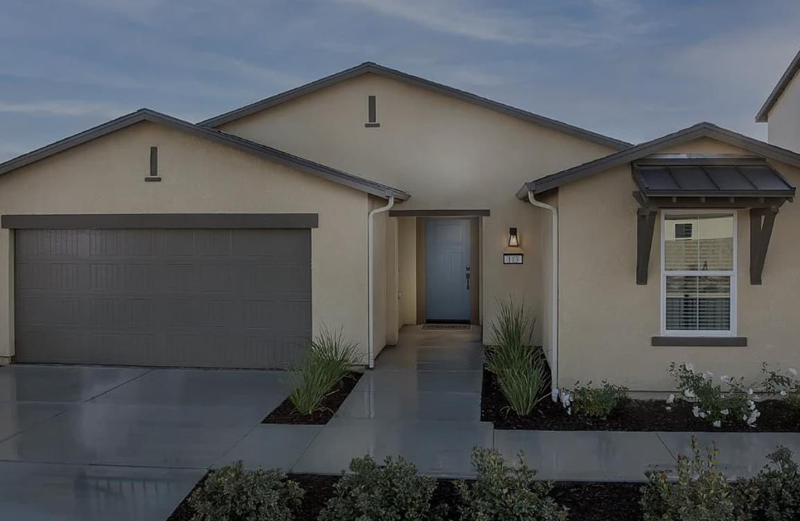 784 Jessie Drive Merced, CA 95348 - Photo 5 of 5 a front view of a house with garden