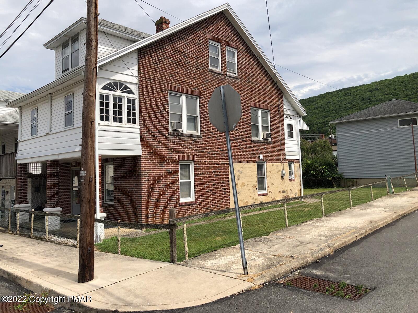 51 Rhume Street Nesquehoning, PA 18240 - Photo 15 of 17 a front view of a house with a yard