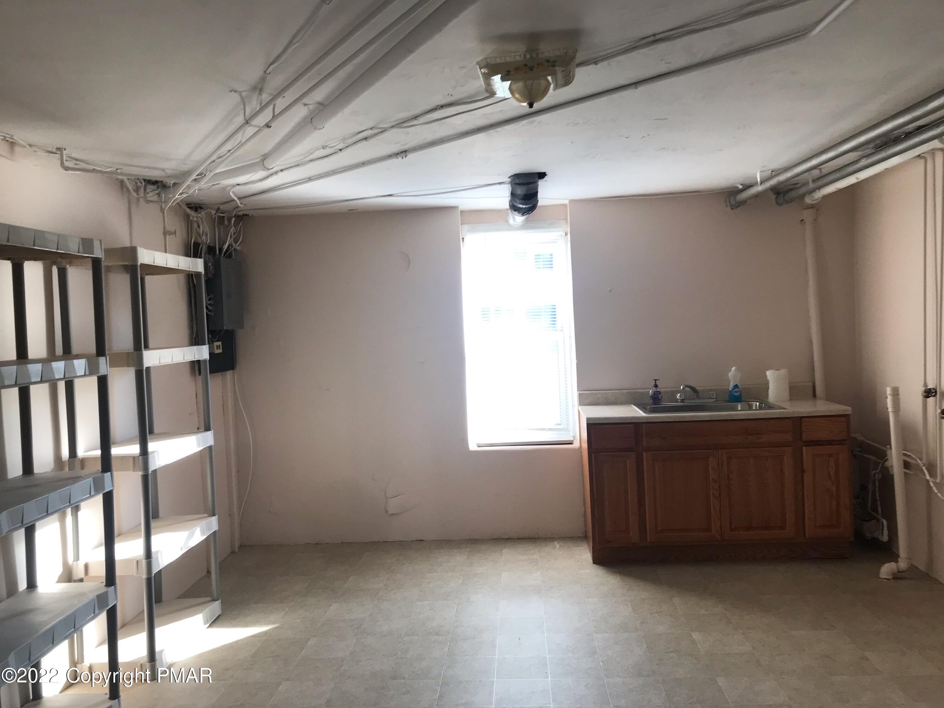 51 Rhume Street Nesquehoning, PA 18240 - Photo 17 of 17 a room with furniture and window