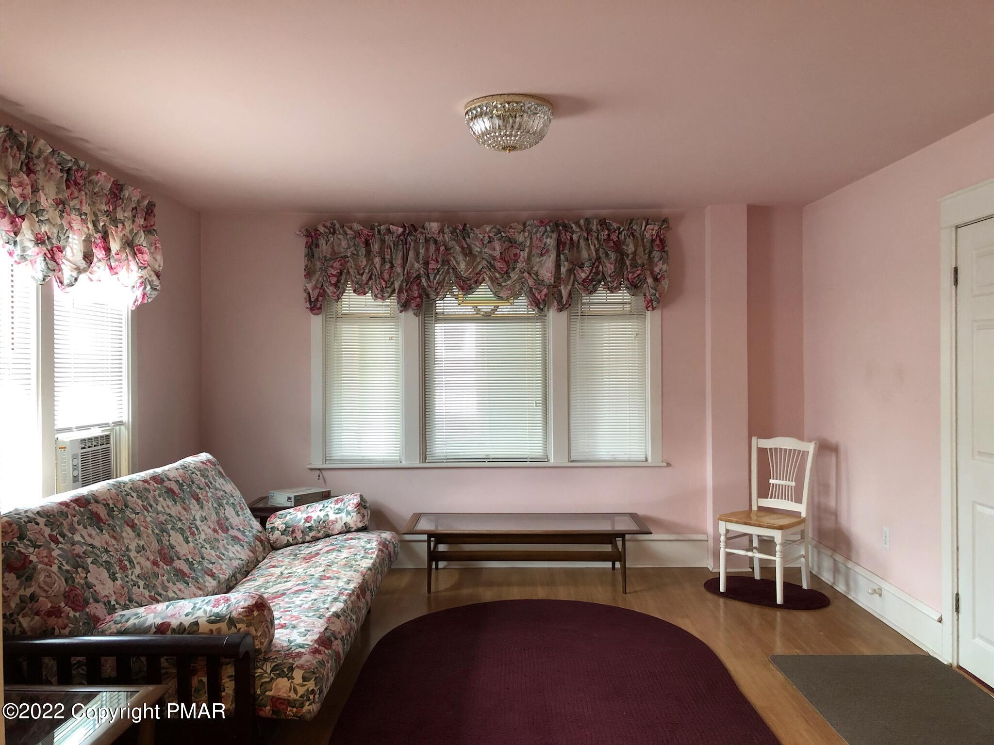 51 Rhume Street Nesquehoning, PA 18240 - Photo 7 of 17 a living room with furniture and a window