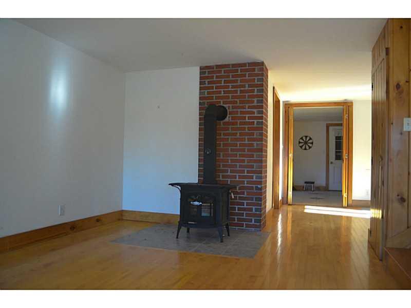 83 5 Islands Road Georgetown, ME 04548 - Photo 7 of 23 Other. Dining room Wood stove