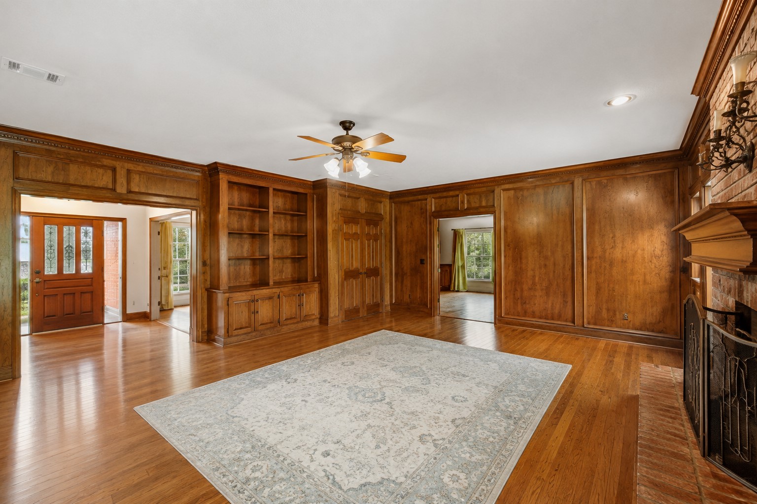 8412 Hidden Trail Lane Spring, TX 77379 - Photo 8 of 36 **Virtually Staged** Family room looking towards the foyer on left and ahead to the kitchen.