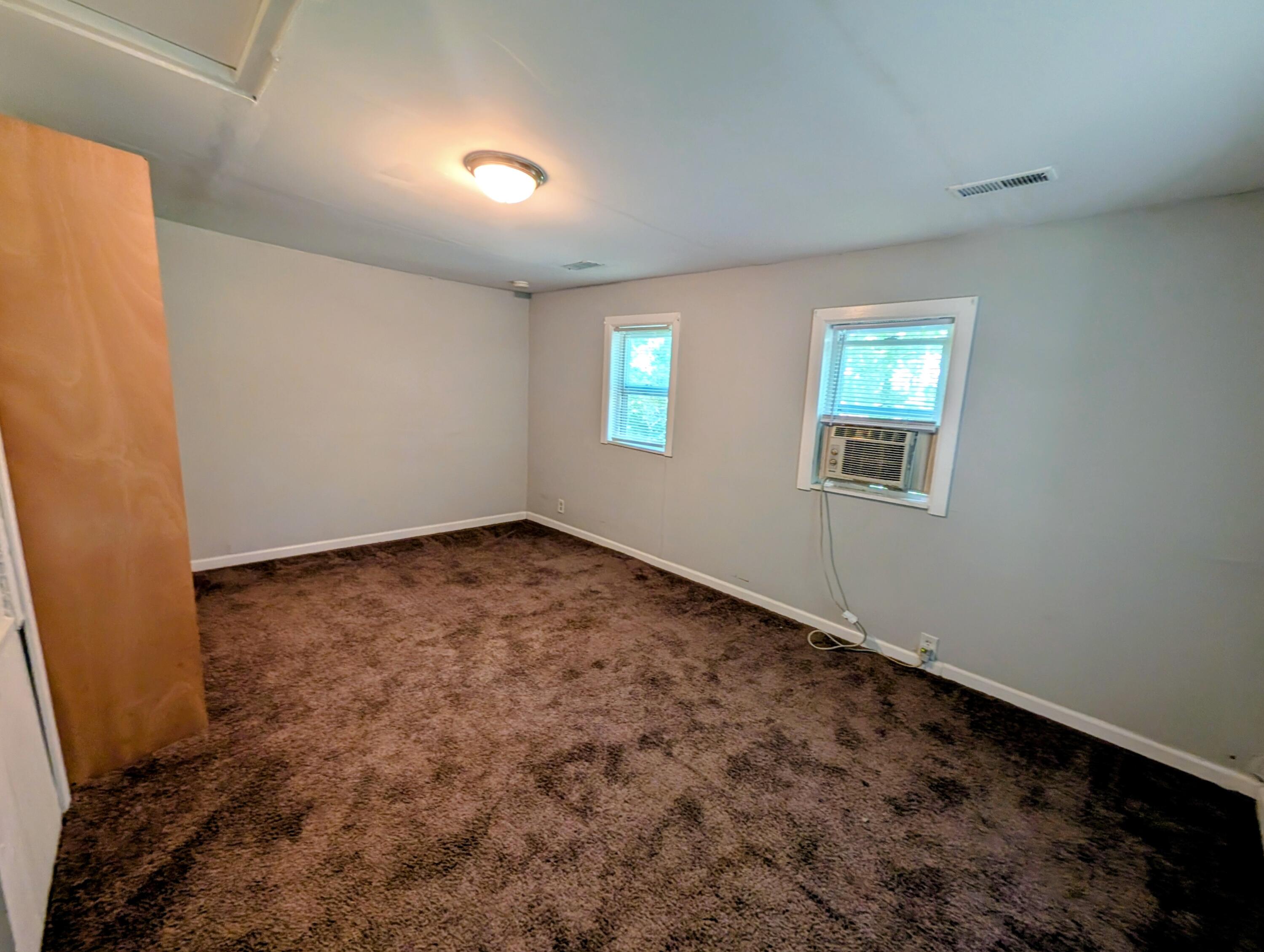 1910 South Calhoun Street Griffith, IN 46319 - Photo 13 of 19 an empty room with windows