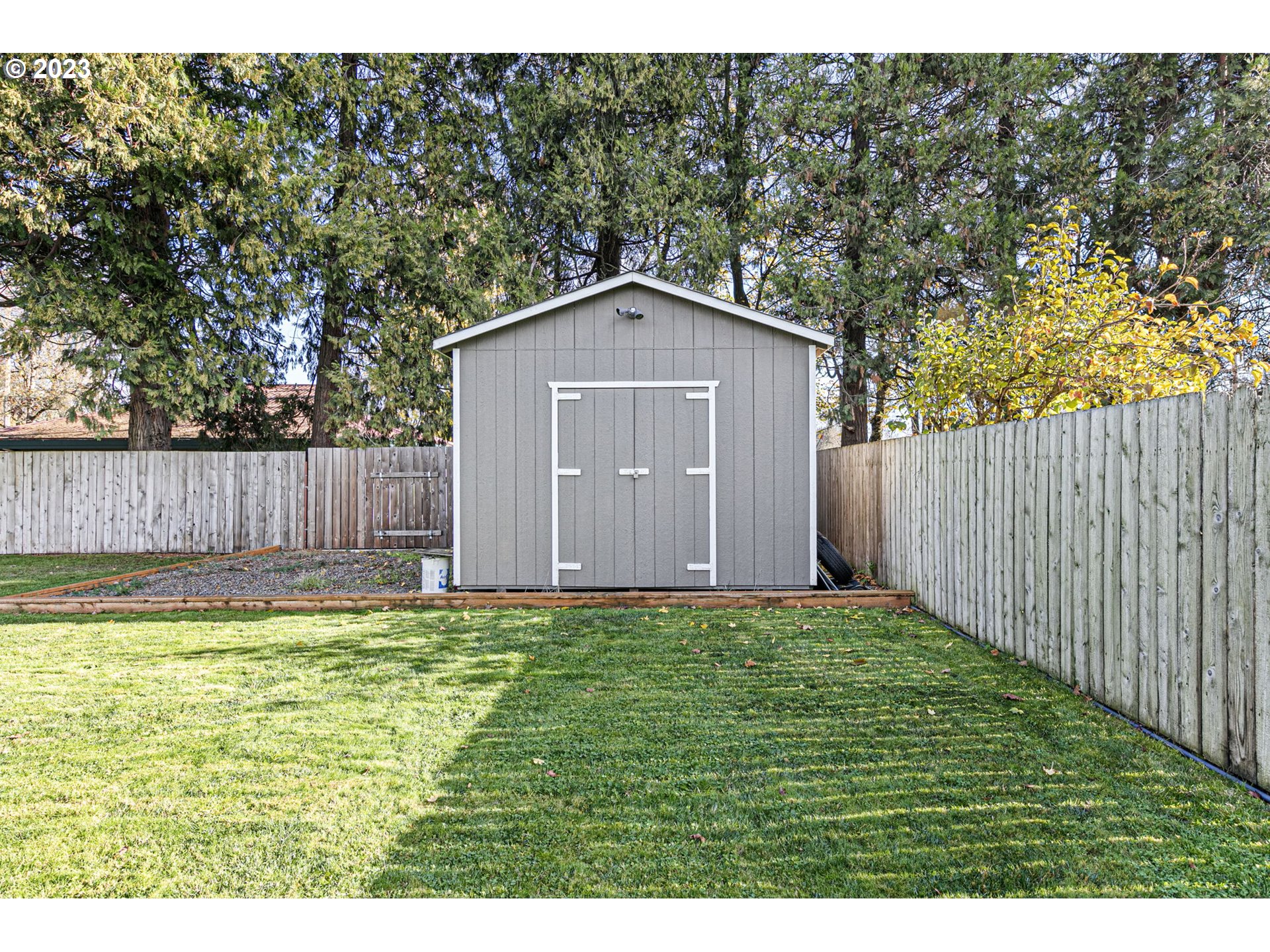2343 Don Street Springfield, OR 97477 - Photo 32 of 34 a view of a backyard with a small cabin