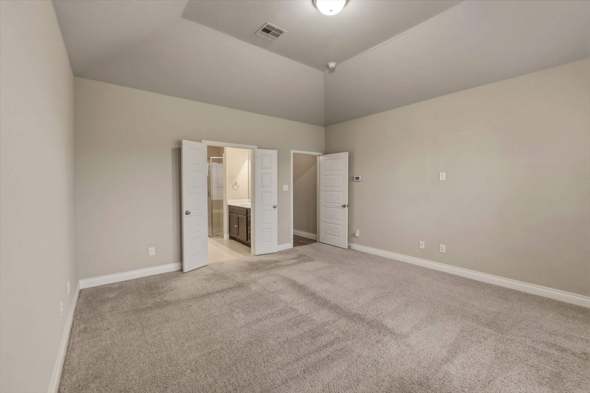 1320 Low Branch Lane Leander, TX 78641 - Photo 20 of 38 an empty room with closet and a chandelier fan
