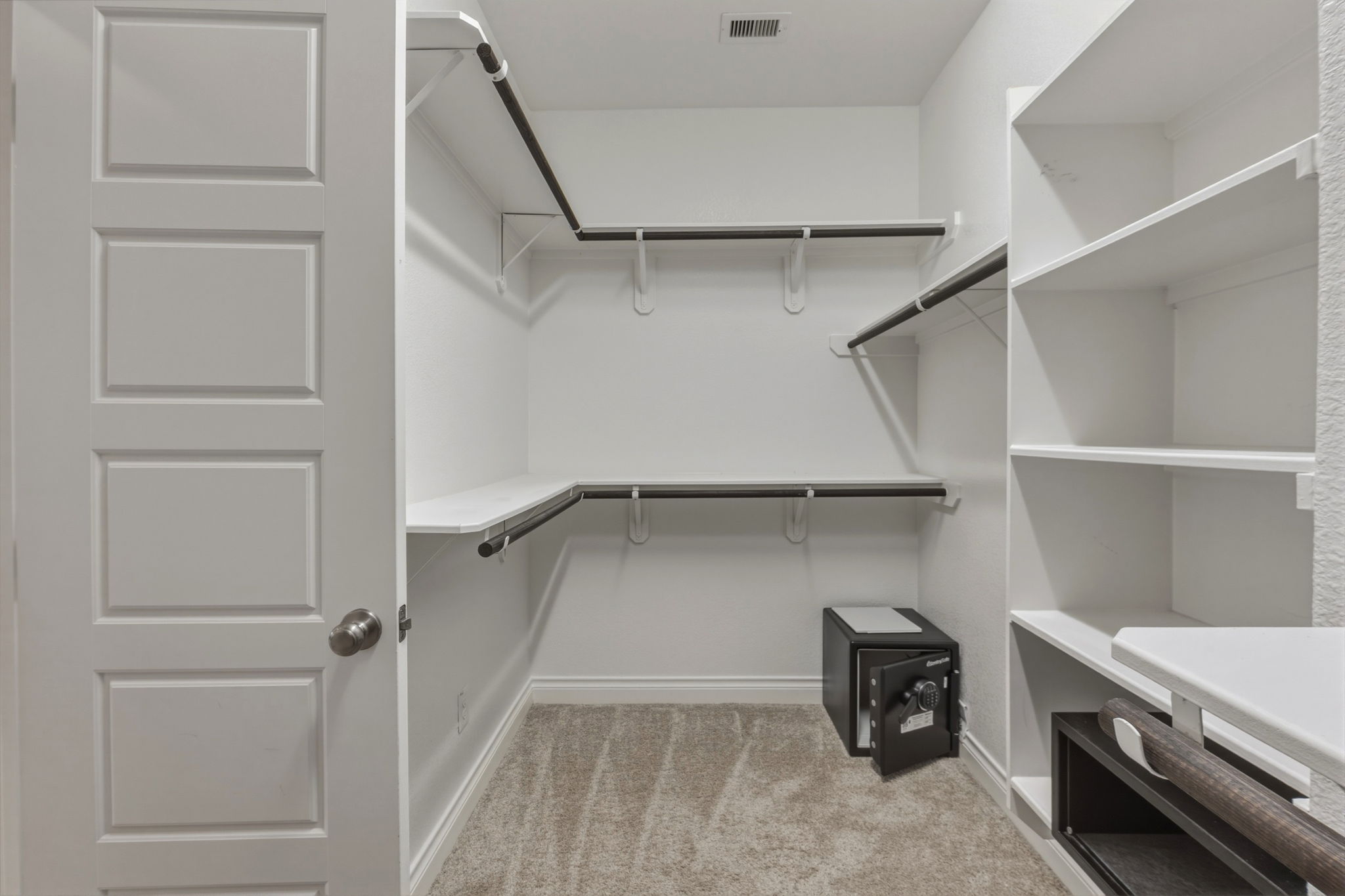1320 Low Branch Lane Leander, TX 78641 - Photo 24 of 38 a view of an empty walk in closet