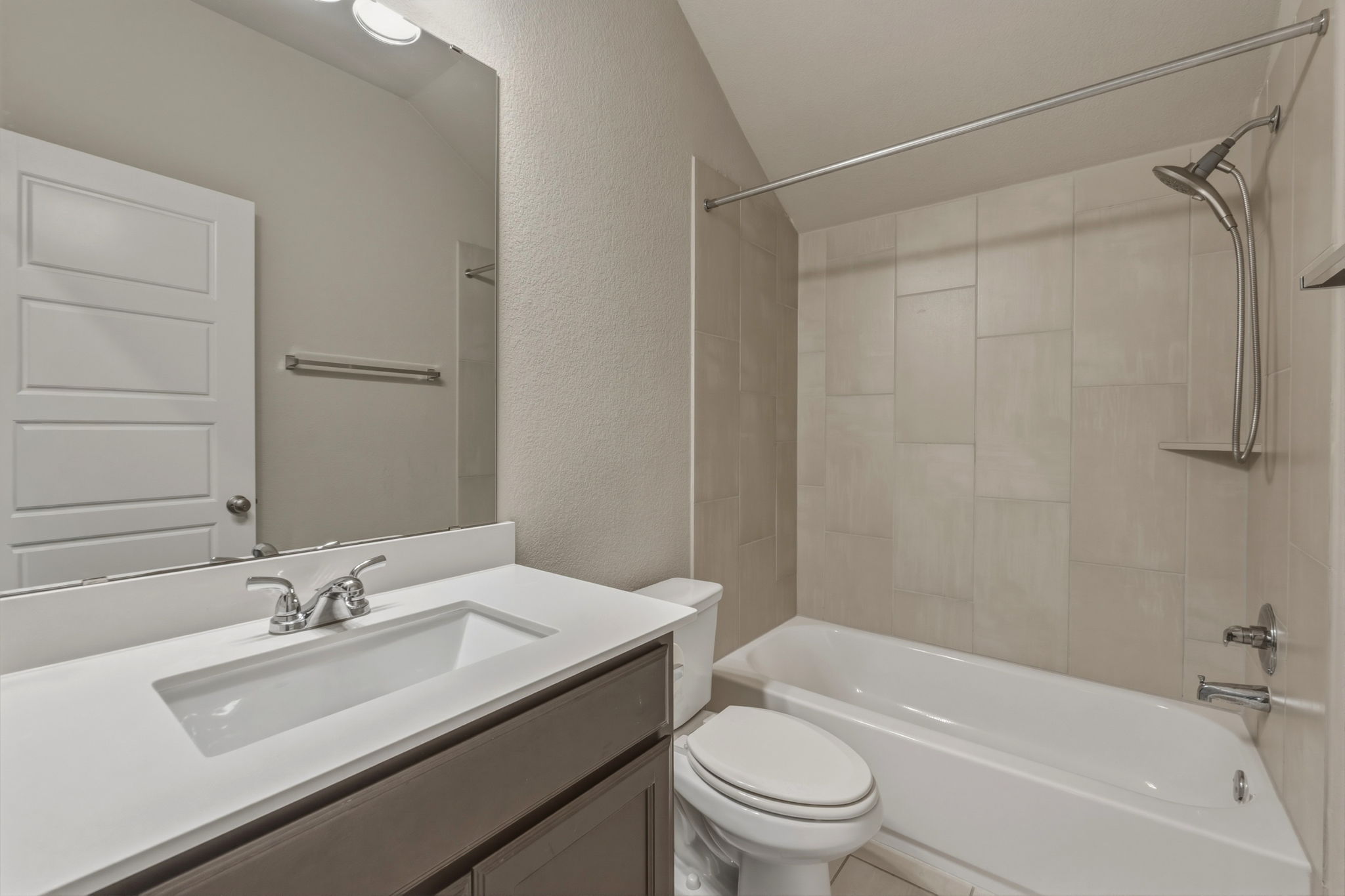 1320 Low Branch Lane Leander, TX 78641 - Photo 29 of 38 a bathroom with a granite countertop sink toilet and shower
