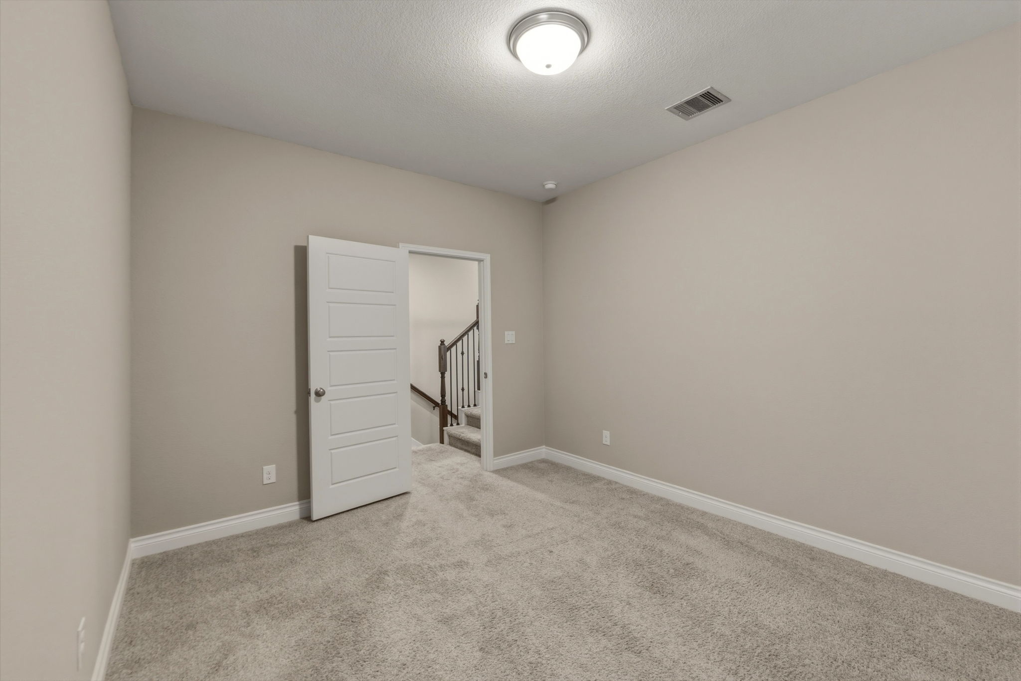 1320 Low Branch Lane Leander, TX 78641 - Photo 31 of 38 an empty room with a ceiling fan and a window