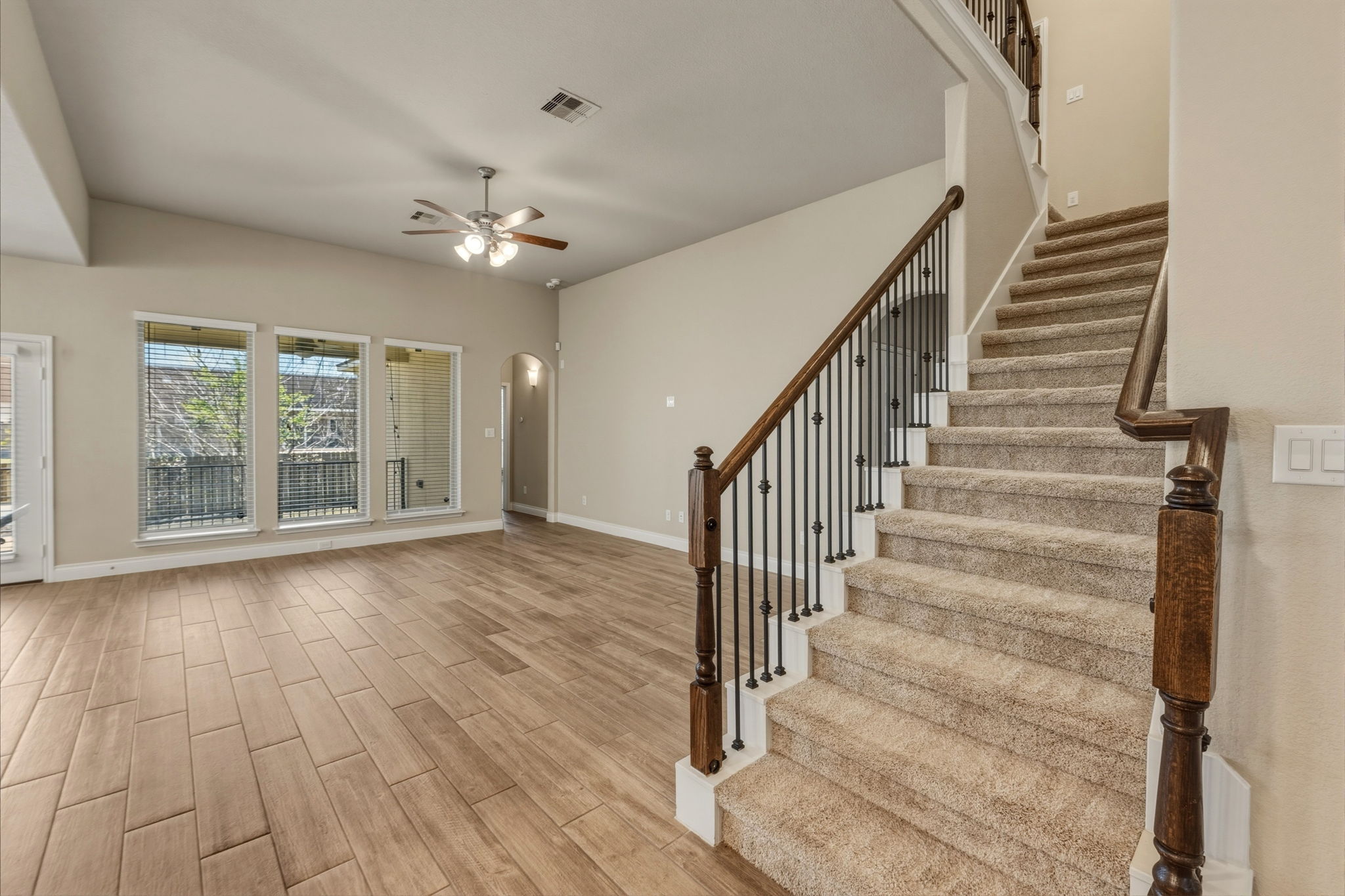 1320 Low Branch Lane Leander, TX 78641 - Photo 8 of 38 wooden floor in an empty room with a window