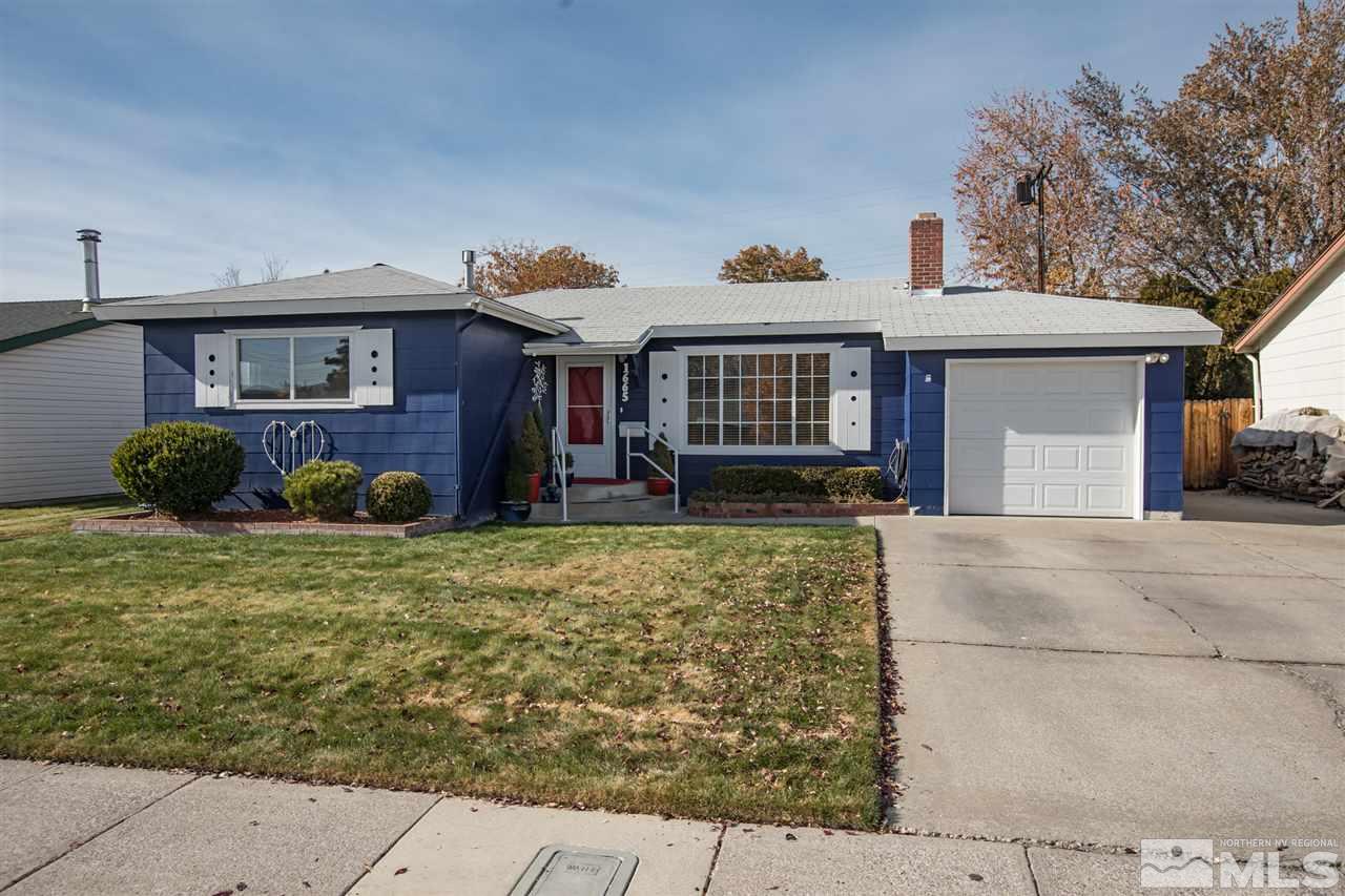 1665 Clemson Road Reno, NV 89502 - Photo 1 of 25 a front view of a house with garden