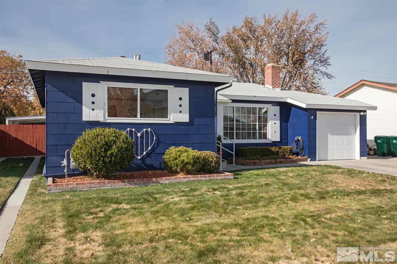 1665 Clemson Road Reno, NV 89502 - Photo 2 of 25 a front view of a house with garden