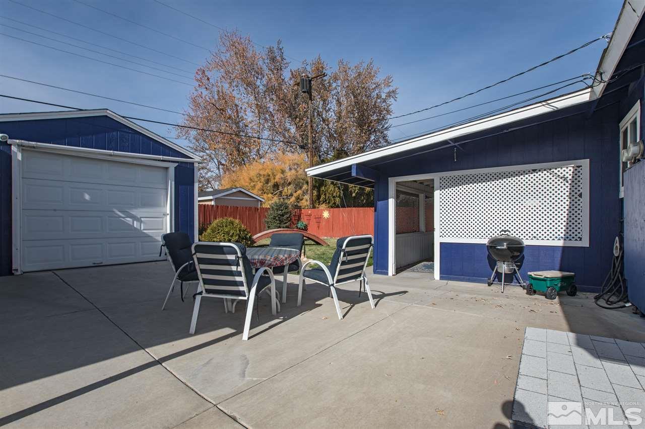 1665 Clemson Road Reno, NV 89502 - Photo 23 of 25 a view of a dinning tables and chairs in patio