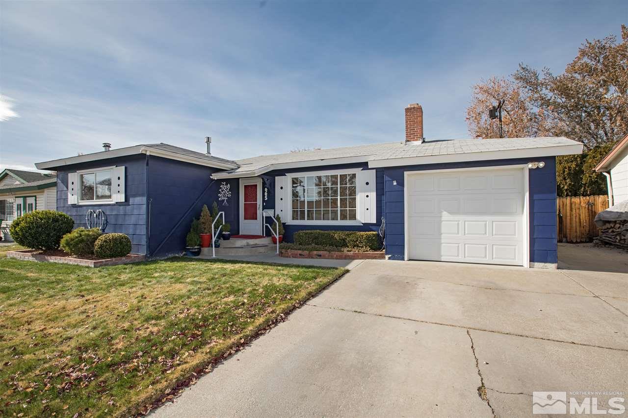 1665 Clemson Road Reno, NV 89502 - Photo 3 of 25 a view of a house with a patio and a yard