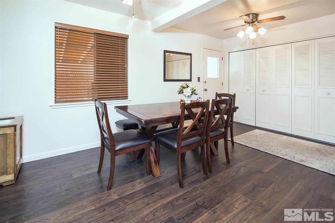 1665 Clemson Road Reno, NV 89502 - Photo 9 of 25 a view of a dining room with furniture and wooden floor