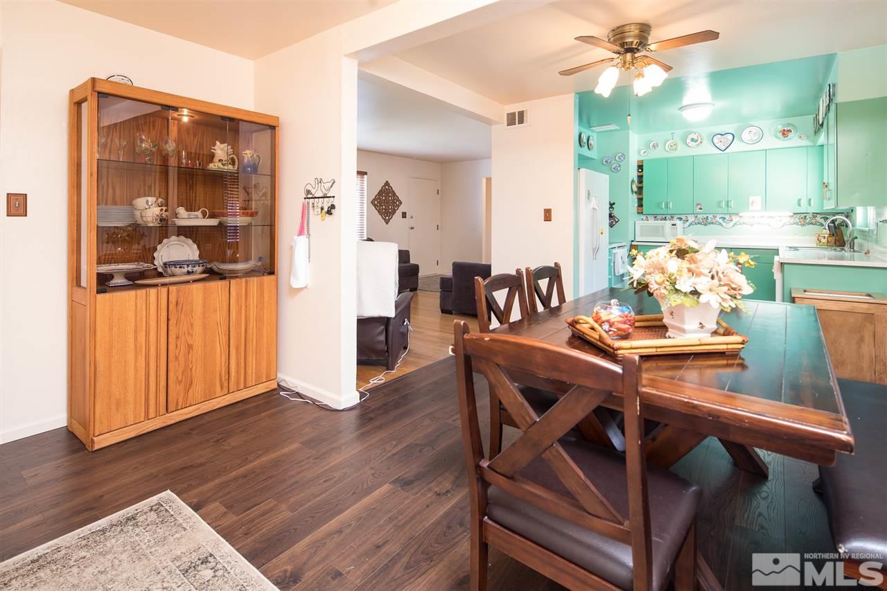 1665 Clemson Road Reno, NV 89502 - Photo 10 of 25 a view of a dining room with furniture and wooden floor