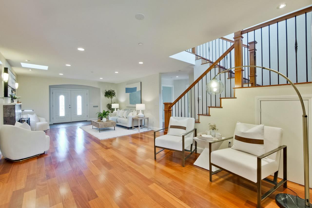 1663 Samedra Street Sunnyvale, CA 94087 - Photo 13 of 79 a living room with furniture and a dining table with wooden floor