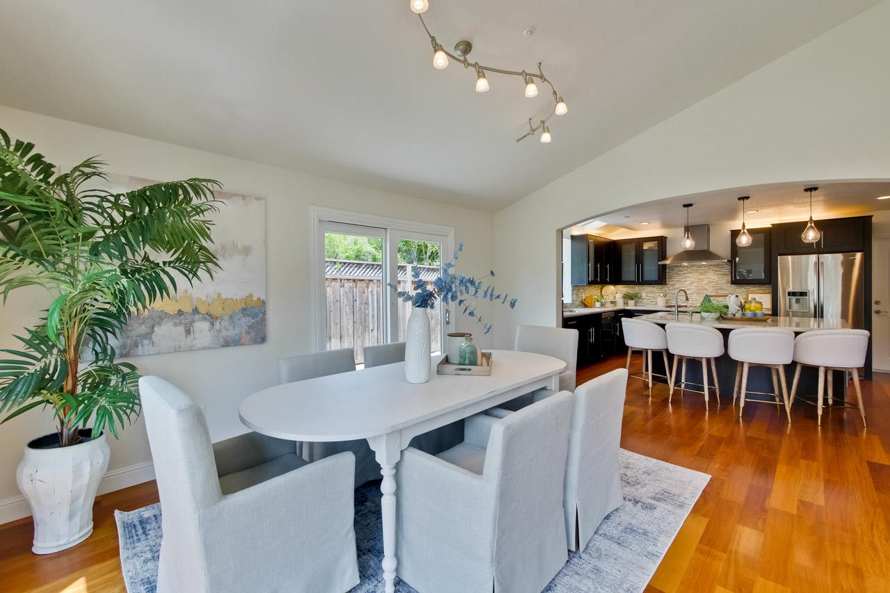 1663 Samedra Street Sunnyvale, CA 94087 - Photo 18 of 79 a view of a dining room with furniture and wooden floor